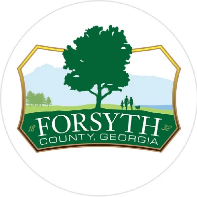 Logo of fosyth county with image of a tree and words written beneath forsyth